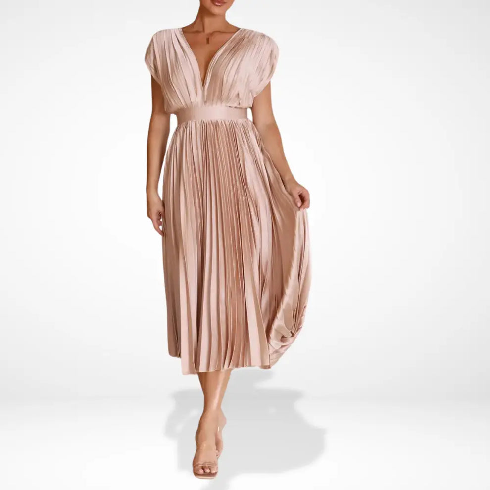 Long pleated dress with deep neckline and elegant styling