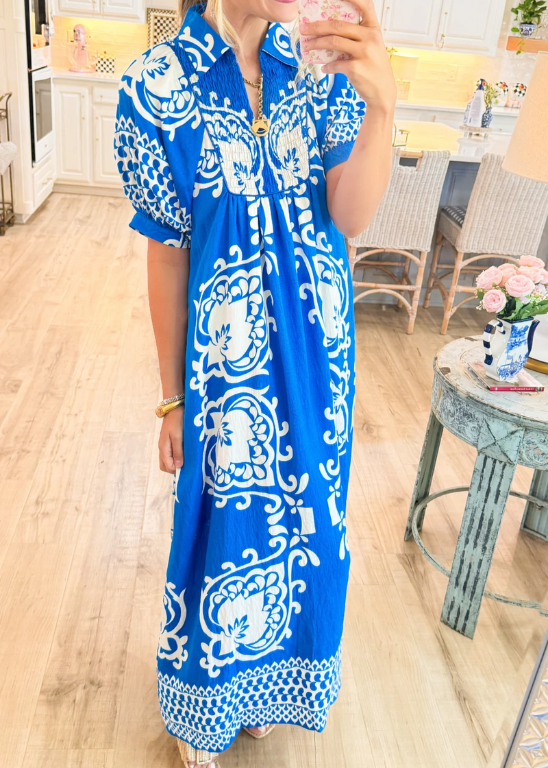 midi dress in boho style with puff sleeves and mix-and-match print