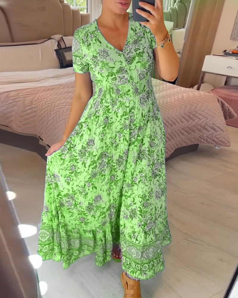 Dress with floral print and V-neckline