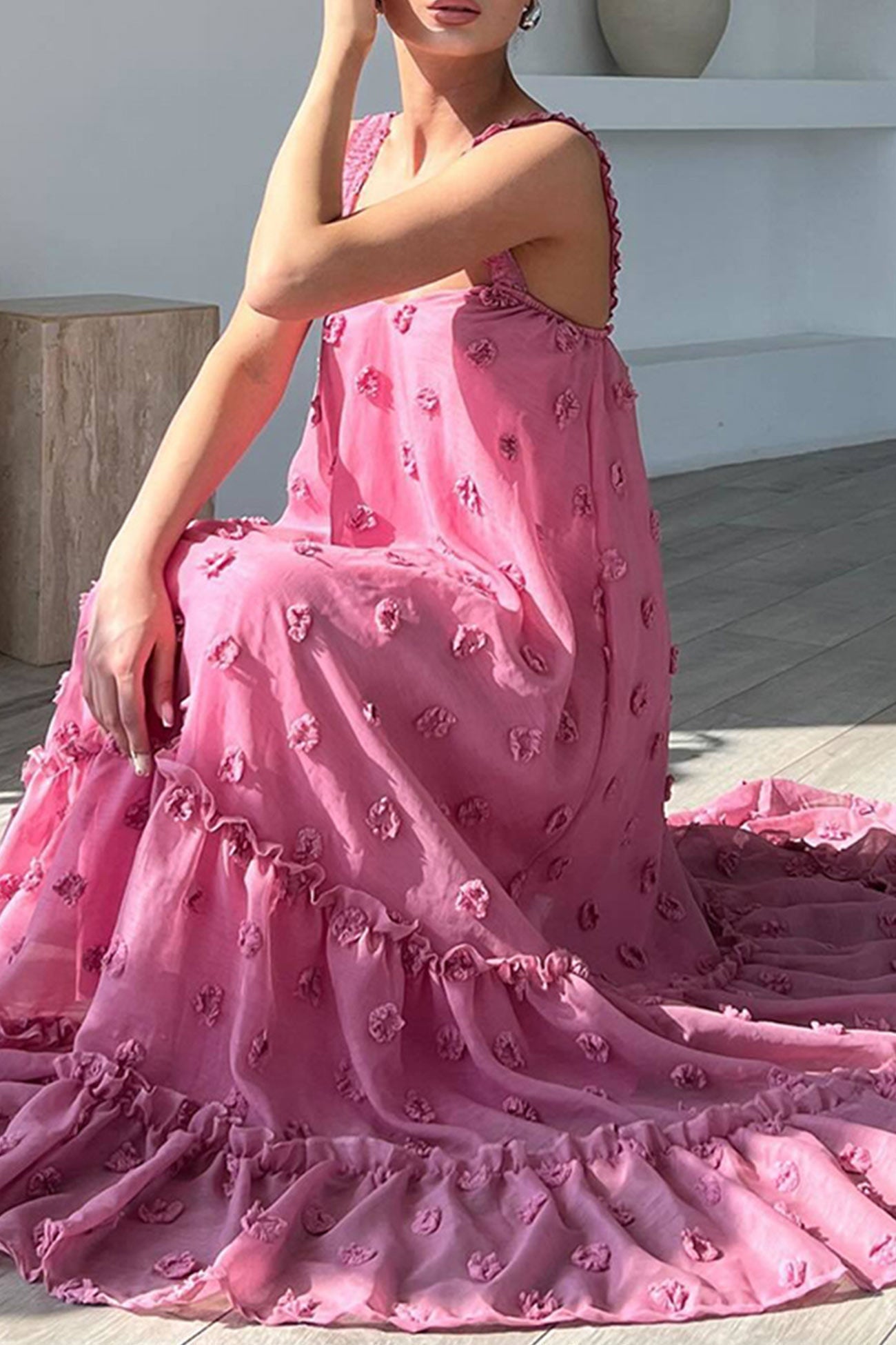 Floral dress with multiple layers and wide hemline