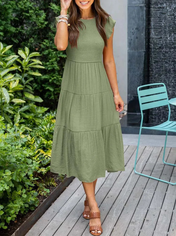 LP | Elegant summer dress with pleats and ruffles