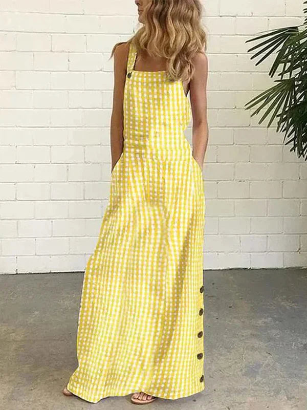 Printed sleeveless dress with buttons and pockets