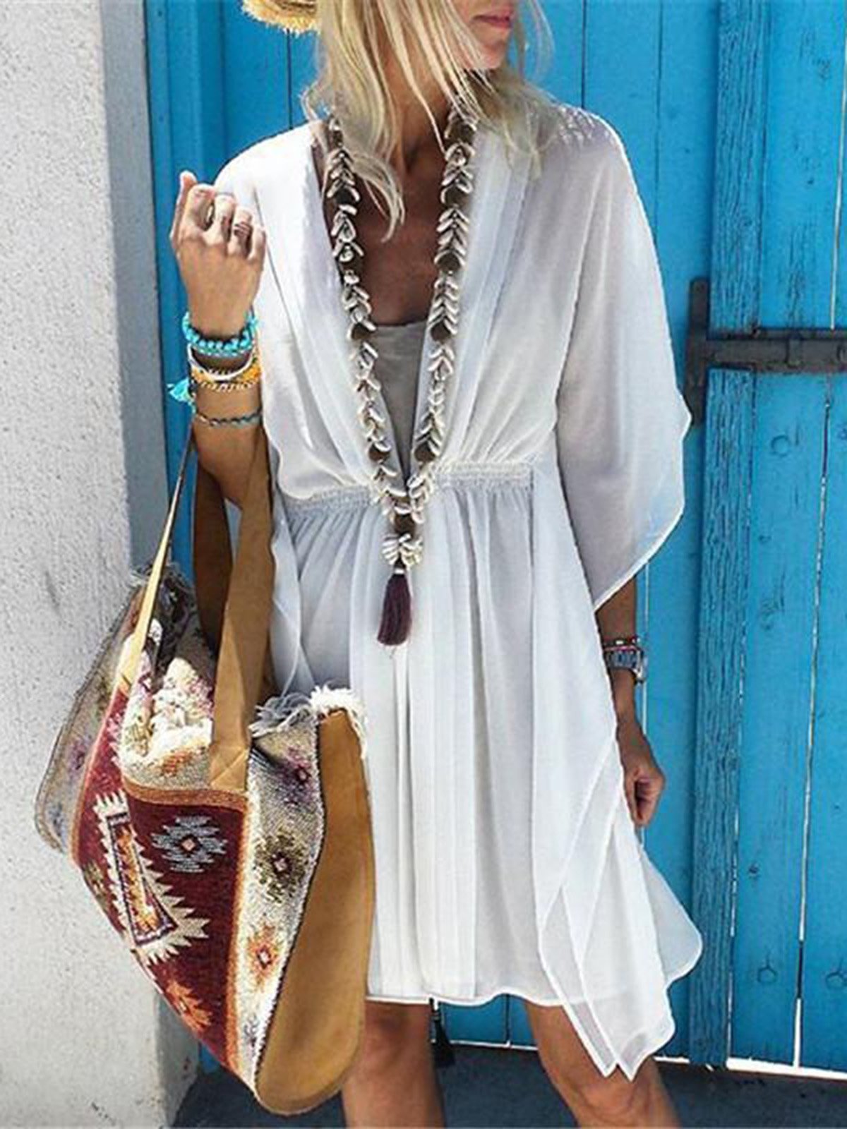 Women's summer dresses with an asymmetrical updo for the beach