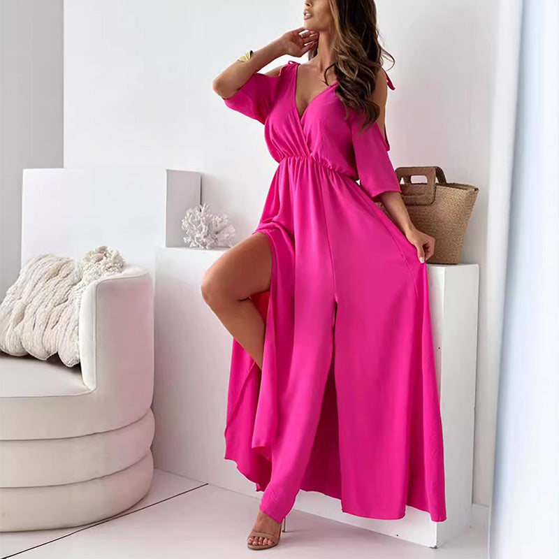 Elegant long dress with crossed neckline and flowing side slit
