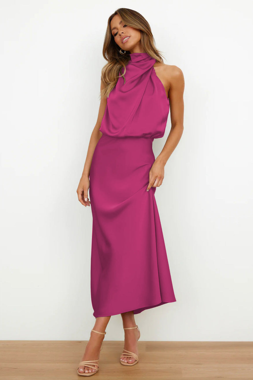 Elegant long dress with an asymmetrical neckline and sophisticated design