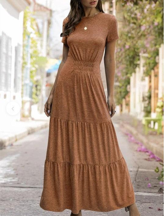 Large flared dress with short sleeves and round neckline