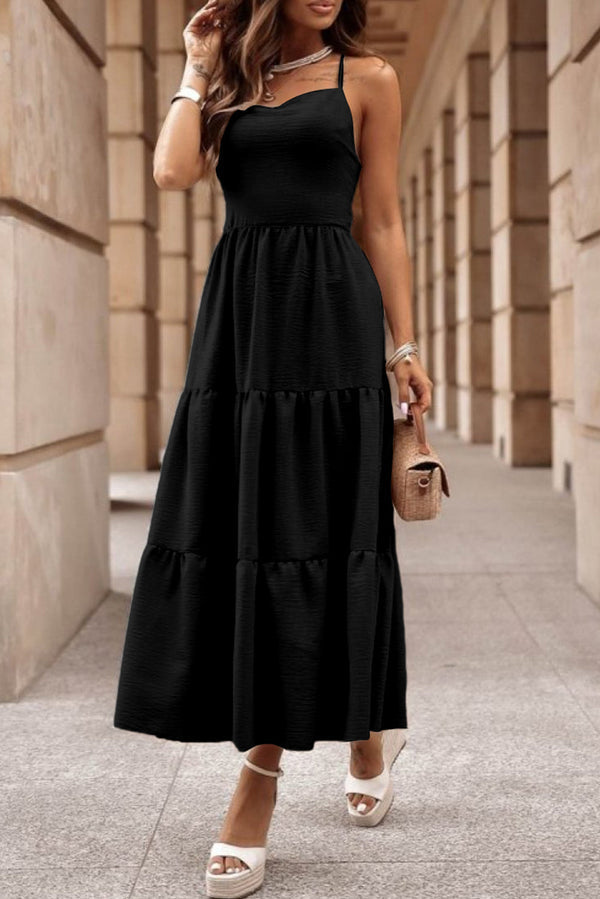 Dress with multiple layers and crossed straps