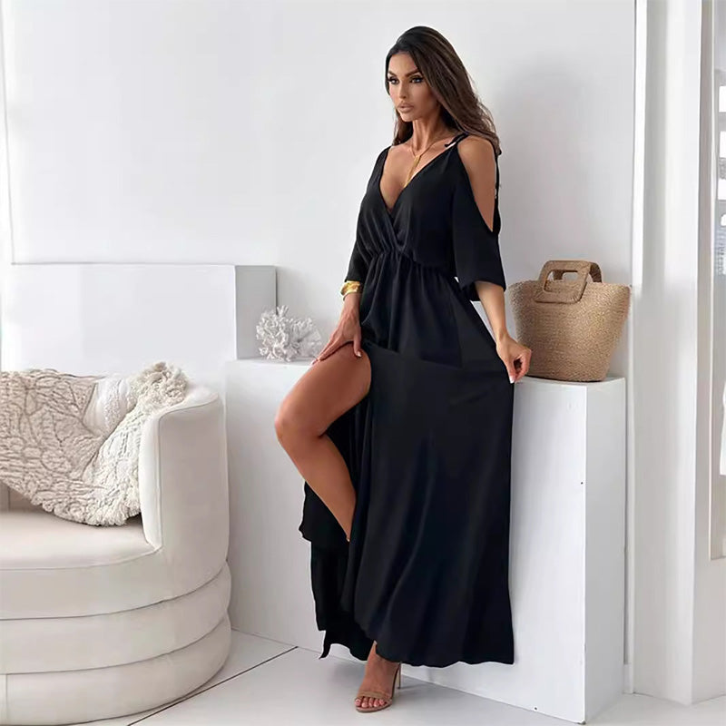 Elegant long dress with crossed neckline and flowing side slit