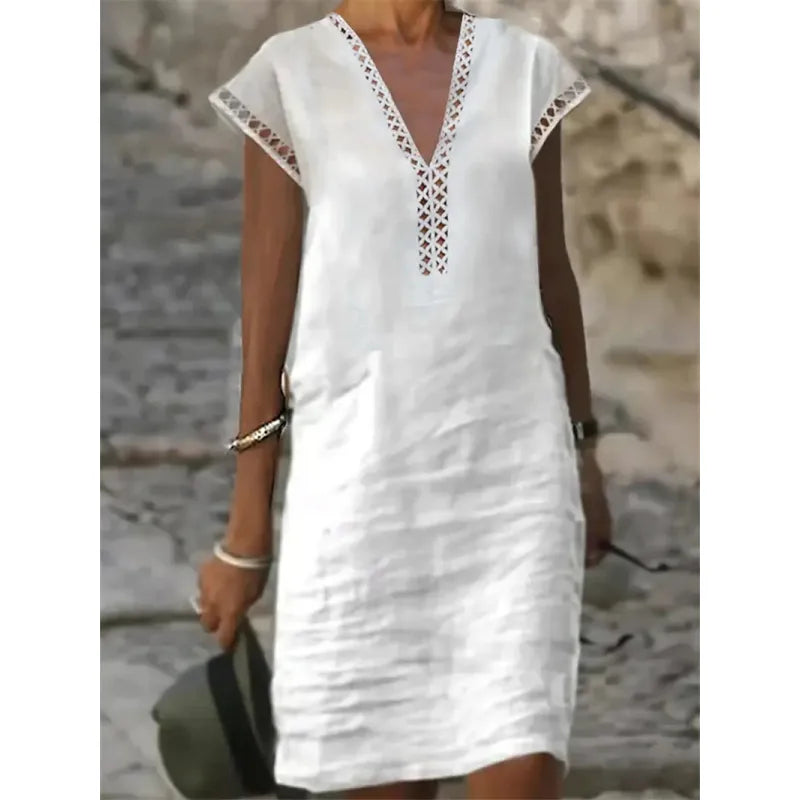 Dress with round neck and lace inset