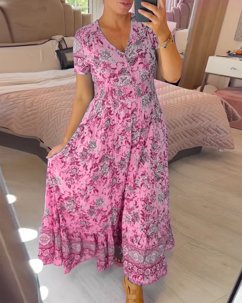 Dress with floral print and V-neckline