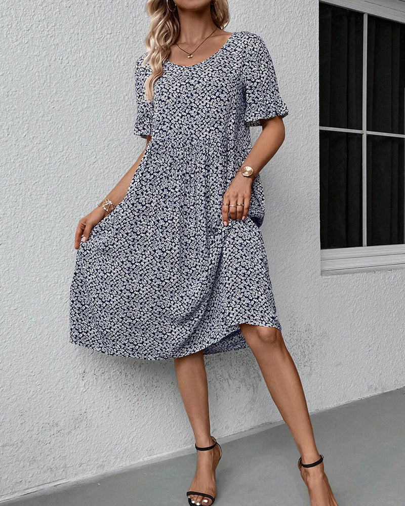 Elegant short dress with short sleeves and delicate floral print