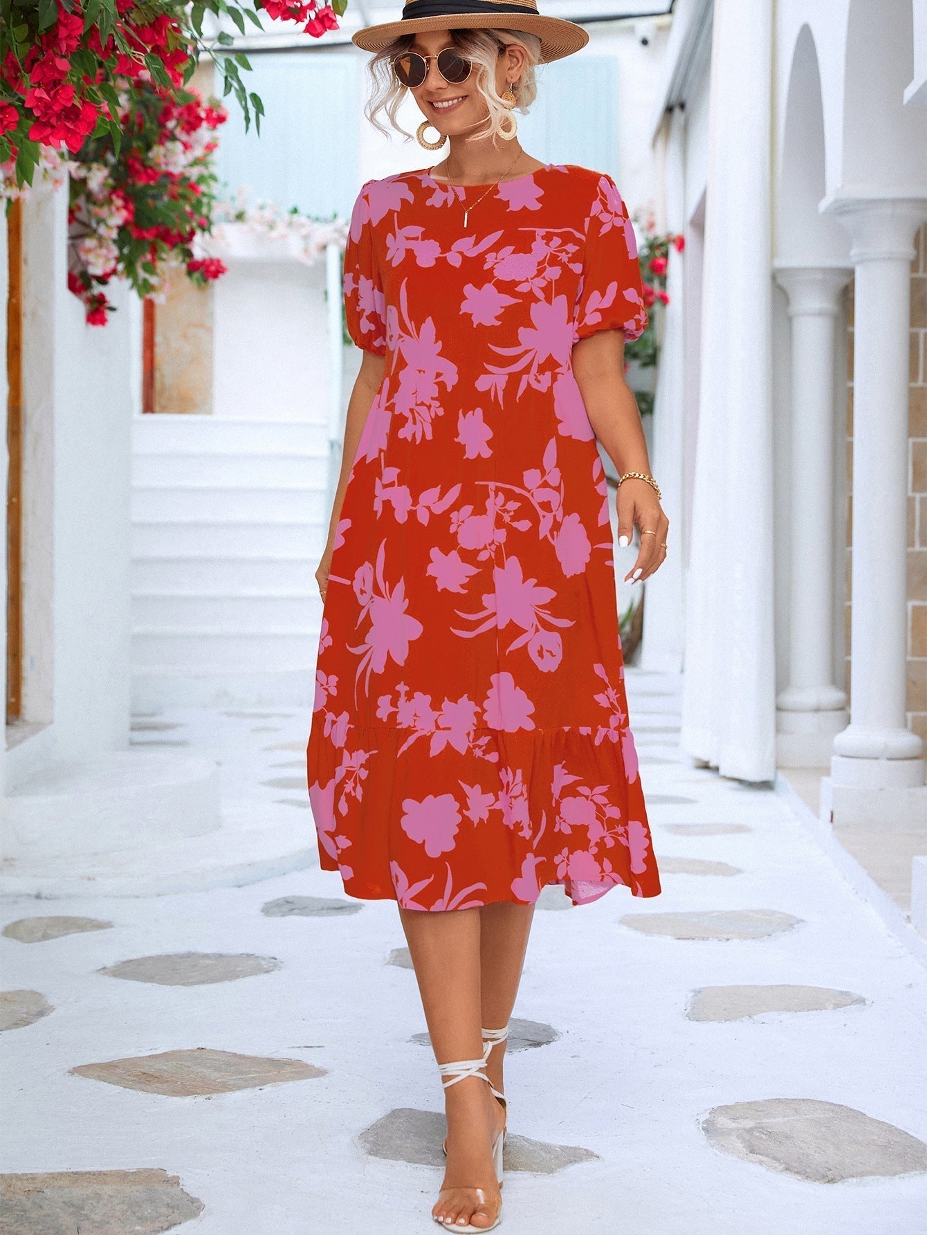 Floral midi dress with puff sleeves and ruffles at the hemline