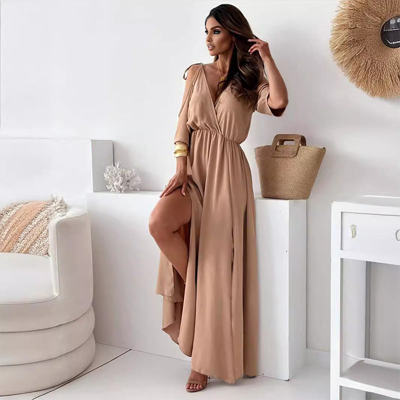 Elegant long dress with crossed neckline and flowing side slit