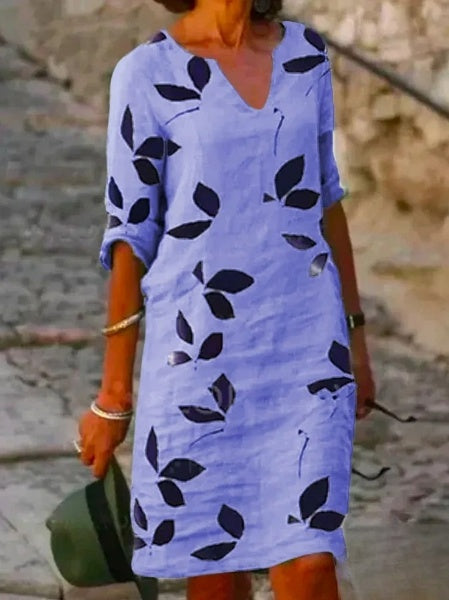 Mc | Basic dress with half sleeves and floral print.