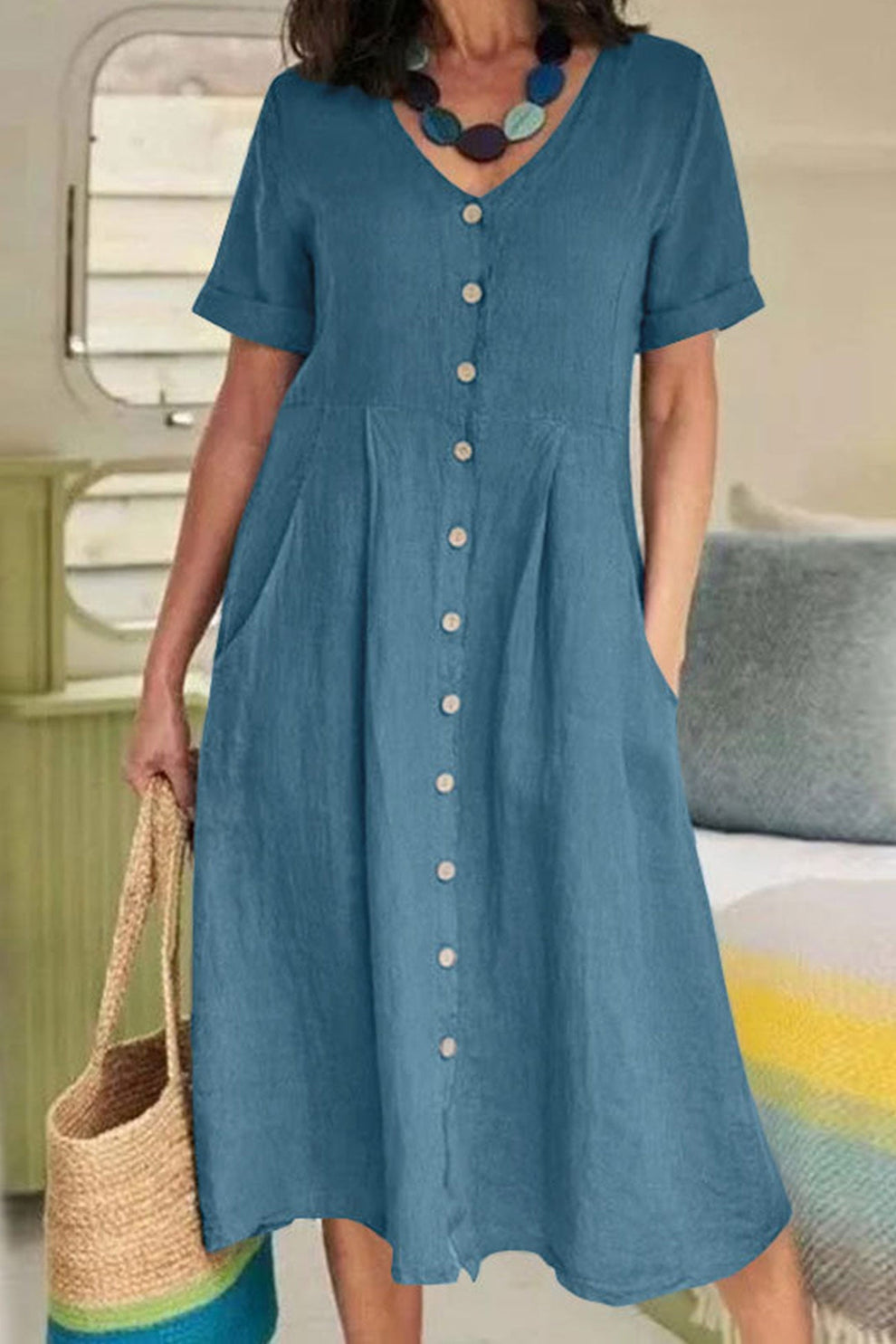Lightweight midi dress with short sleeves and button-up shirt style