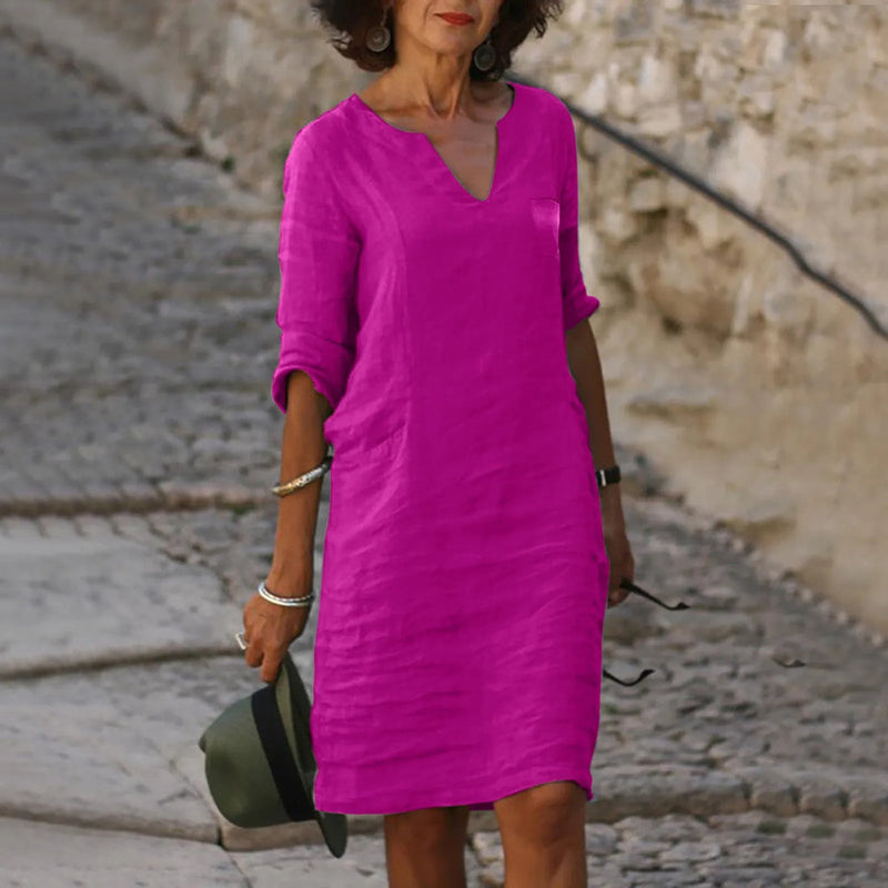 Elegant classic knee-length dress with three-quarter sleeves