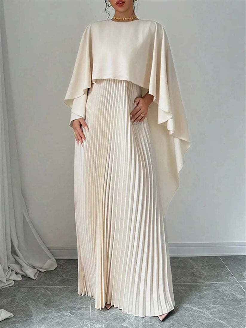 Long pleated dress with flowing detail for elegant occasions