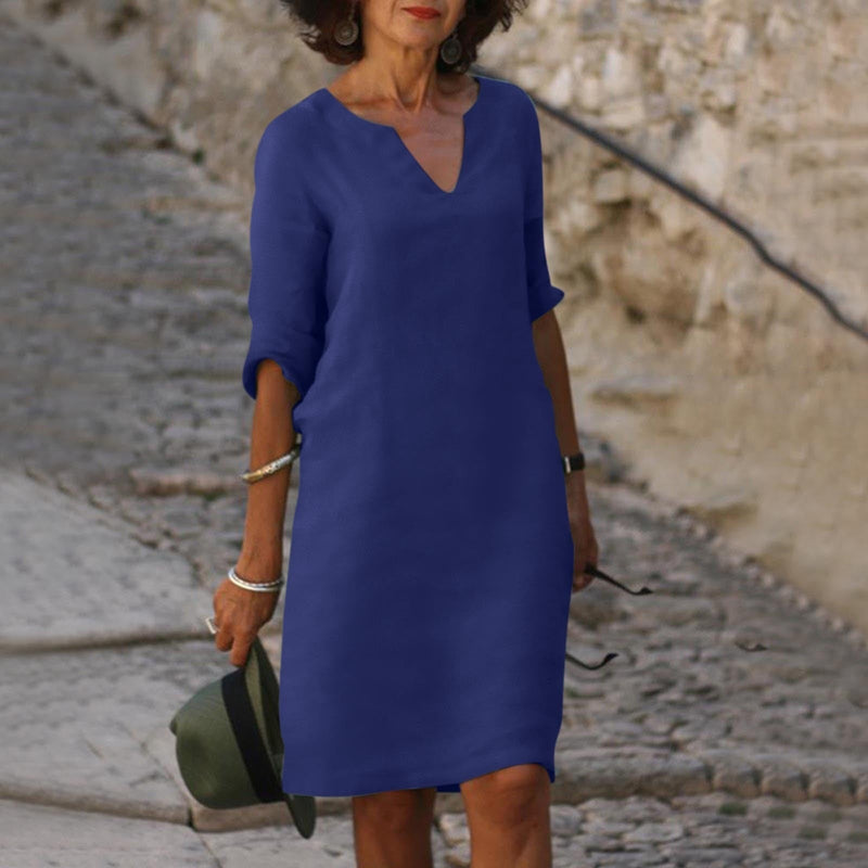 Elegant classic knee-length dress with three-quarter sleeves