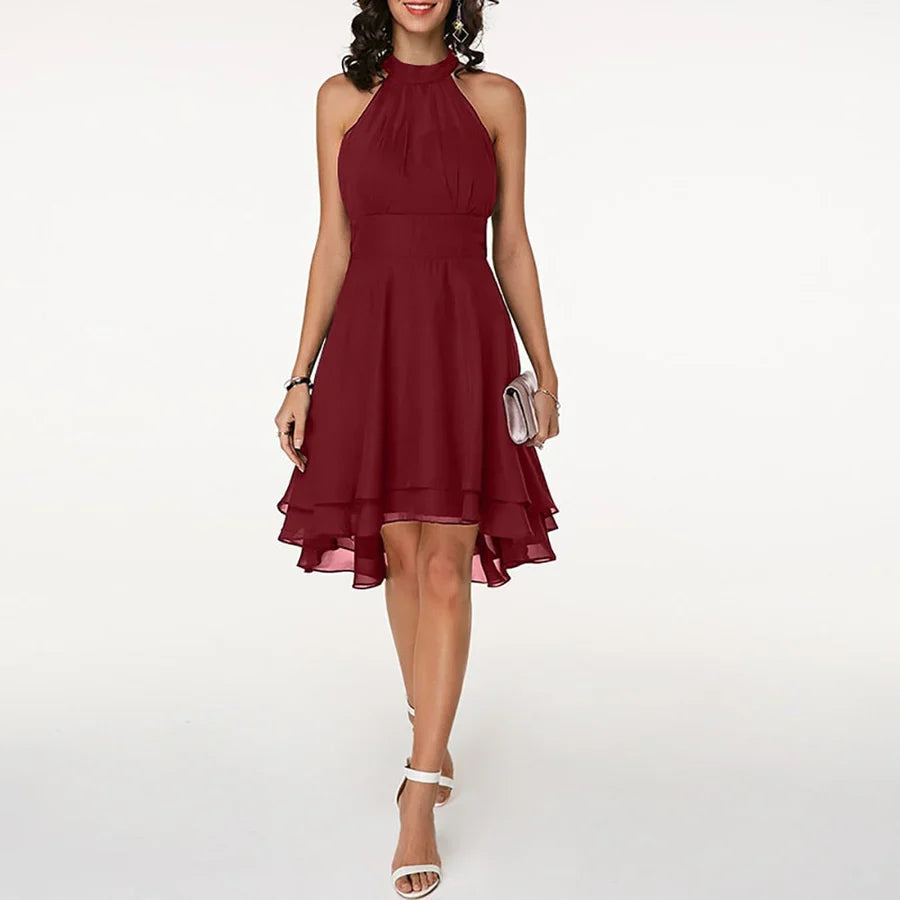 Elegant short dress with ruffles and asymmetrical halter-neck design