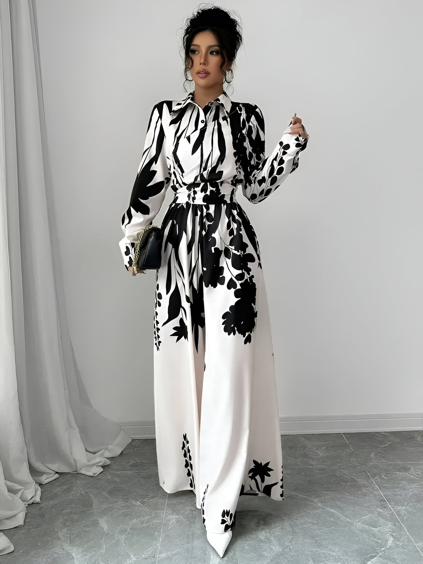 Benigna | Long-sleeved jumpsuit with belt