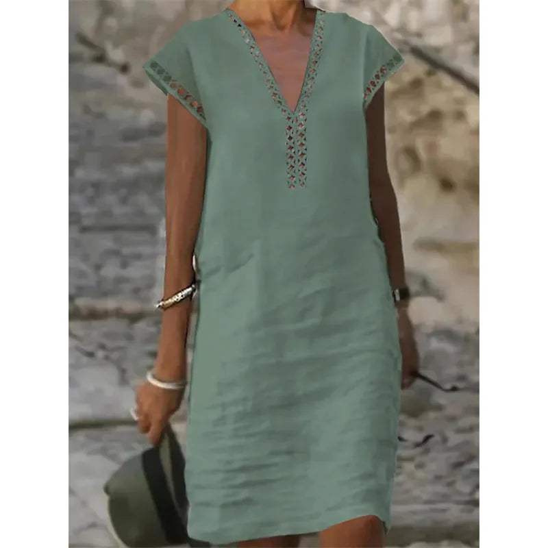 Dress with round neck and lace inset