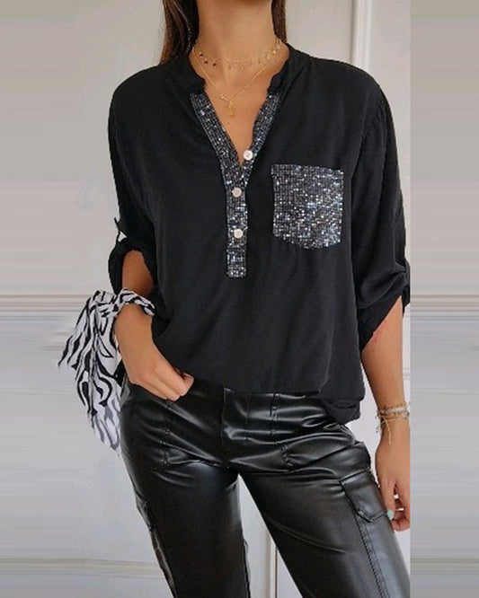 Loose-fitting sequin blouse