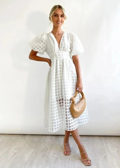 Checkered dress with ruffled sleeves