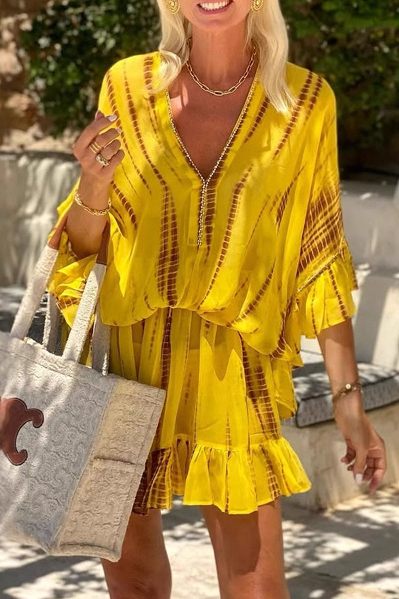 LP | Casual vacation dresses in line with geometric print, ruffles and V-neckline