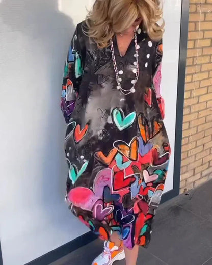 LP | V-neck dress with heart motif and long sleeves