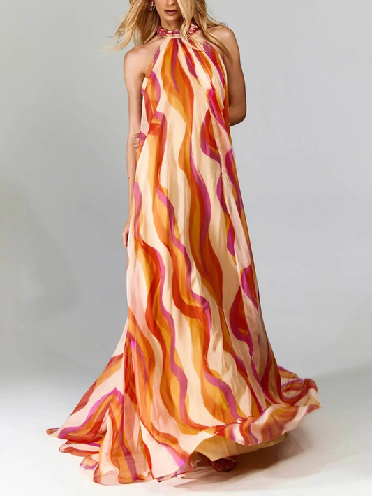 Elegant long summer dress with halter neck and flounce print