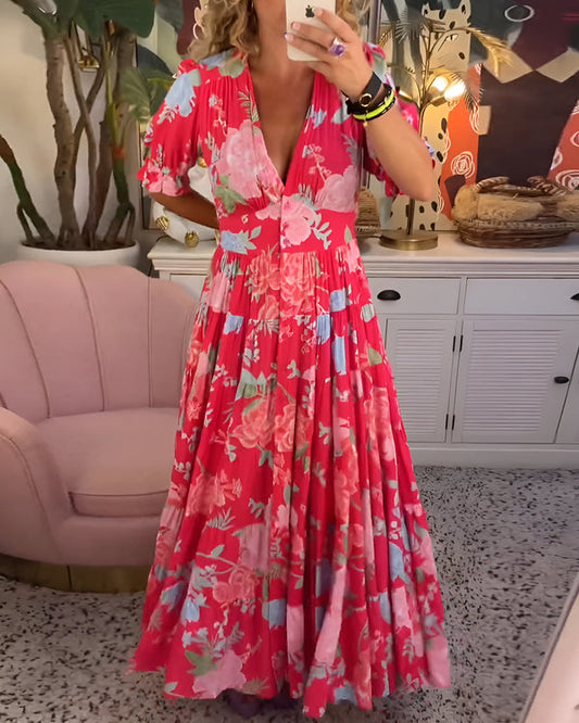 Long dress with V-neckline, short sleeves and button front closure