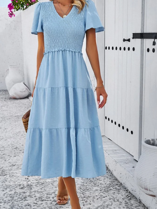 Dress with short sleeves and V-neckline