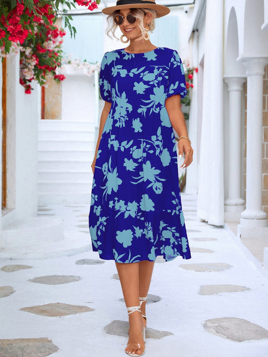 Floral midi dress with puff sleeves and ruffles at the hemline