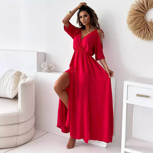 Elegant long dress with crossed neckline and flowing side slit