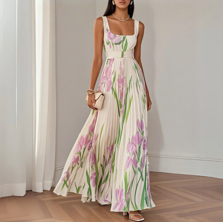 Elegant long dress with straps, pleated skirt and delicate floral print