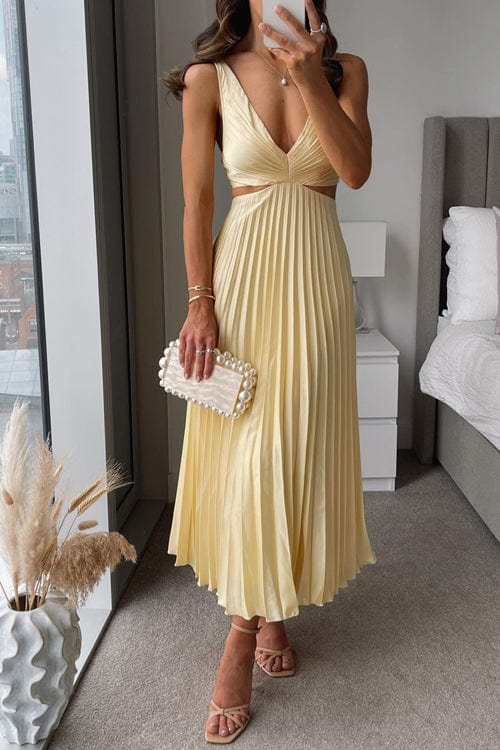 Pleated dress with cut-outs