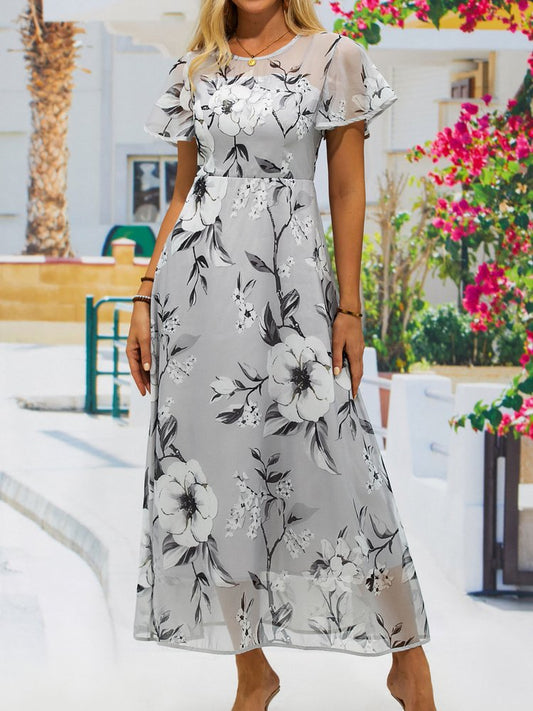 Dress with floral print and round neckline
