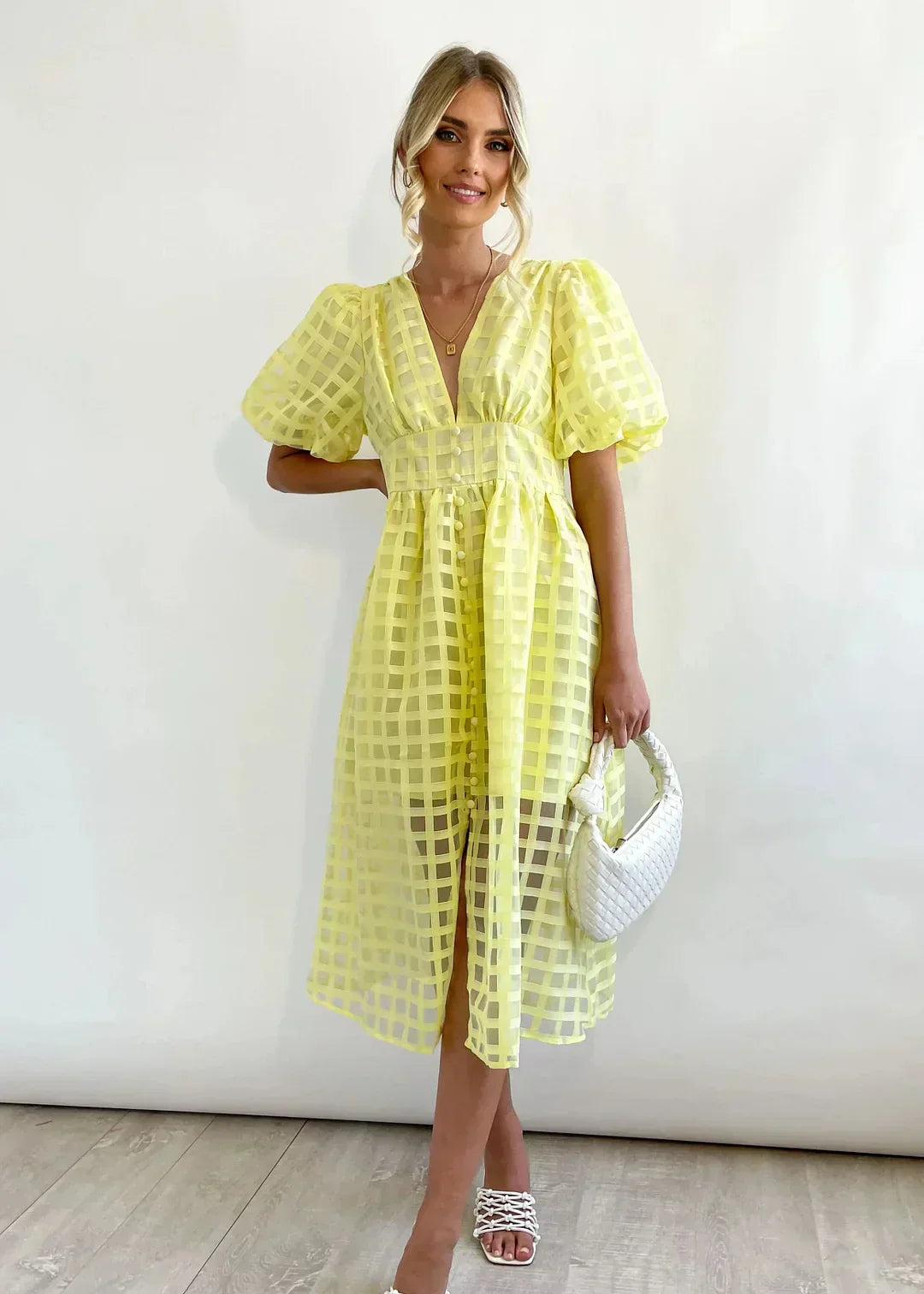Checkered dress with ruffled sleeves
