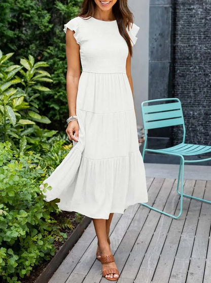 LP | Elegant summer dress with pleats and ruffles