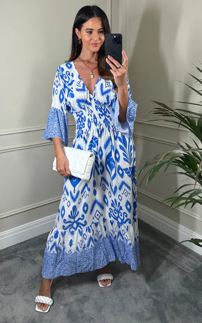 LD Long dress with V-neck and floral print in blue and white