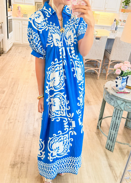 midi dress in boho style with puff sleeves and mix-and-match print