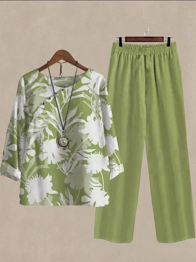 LD two-piece jumpsuit with long sleeves, green plant print and round neckline