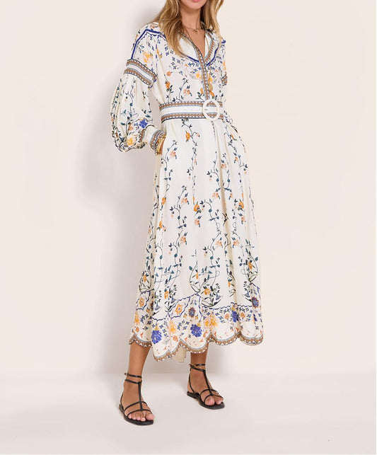 Long dress with long sleeves and a delicate nature-inspired print