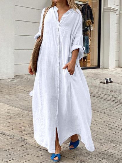 Loose casual one-color pocket dress with one row of buttons and long sleeves