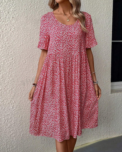 Elegant short dress with short sleeves and delicate floral print