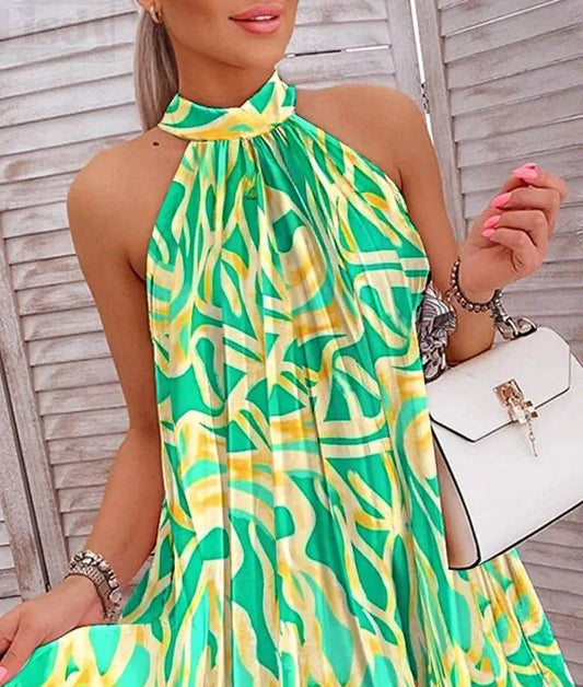 Pleated sleeveless cocktail dress with print