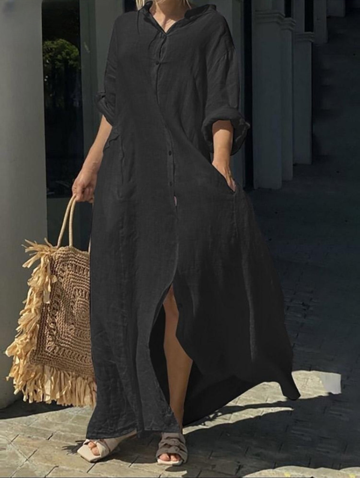 Loose casual one-color pocket dress with one row of buttons and long sleeves