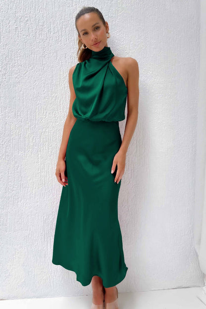 Elegant long dress with an asymmetrical neckline and sophisticated design