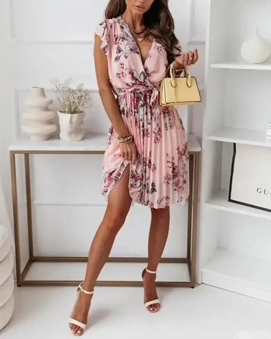Pleated dress with floral print and belt
