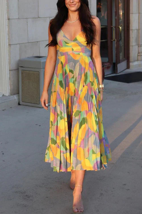 Printed dress with pleats and V-neckline